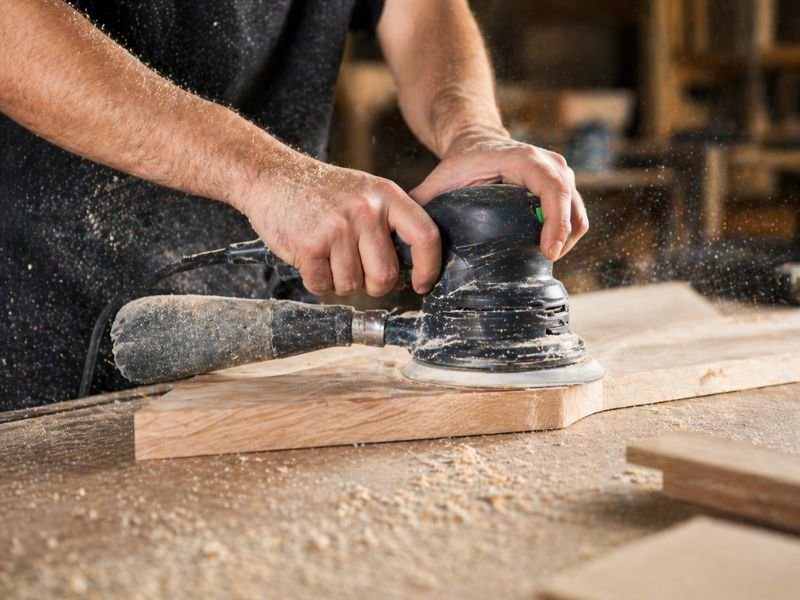 Woodworking dust extraction system in furniture manufacturing